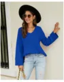 Close-up view of the stylish royal blue V-neck long sleeve knit sweater in casual style. - Blue