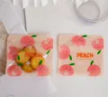 Detalle de primer plano de bolsas de embalaje de plástico sellables con patrón de melocotón. - Tamaño Pequeño 10x11cm (50 Piezas/Paquete)