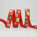 Christmas red ribbon with white snowflakes and green dots, ideal for gift wrapping and holiday decor - Red