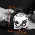 Detailed view of the Halloween pumpkin and cat treat paper box with clear dimensions for party. - 11.5*7*16cm