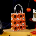 Halloween papieren cadeauzakje met doodshoofd en vleermuis print voor feestelijke traktaties. - Schedel Grafsteen / 15x12x7cm (Mini)