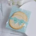 Clear self-adhesive plastic packaging bag details with blue polka dot and bow for gifts. - Around 100 Pieces Per Pack (8*10+3 cm) / Blue