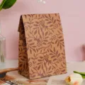 Vintage brown kraft paper gift bag with botanical leaf pattern, elegant flat mouth design. - Small Leaves Pattern / M