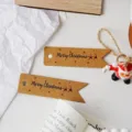 Vintage kraft paper swallowtail gift tags with Merry Christmas print for holiday decoration. - Black Font Christmas Deer Style