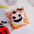 Halloween self-adhesive cookie candy plastic bags with spooky ghost and pumpkin prints for party. - White Ghost / 100pcs Pack