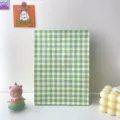 Gruene karo geschaeft papiergeschenktuete fuer kleine gegenstaende und suessigkeiten - Grün