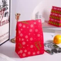 Sacchetto regalo di Natale in carta con fiocco festivo e stampa Merry Christmas. - 12x23x7.5cm / Neve di Natale
