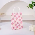 Piccolo sacchetto regalo in carta rosa con motivo di pesche e manici bianchi per feste e caramelle. - Pesca / Taglia S