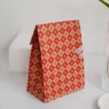 Vintage red and gold patterned paper gift bag for packaging retro style presents securely. - Red Flower / M