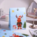 Christmas gift paper bag with cute cartoon reindeer and tree design, ideal holiday packaging. - 12x23x7.5cm / Elk
