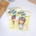Vista dettagliata di sacchetti richiudibili carini con design giallo e simpatici grafiche di orsi. - Stile B Good Day 17x12cm Plastica