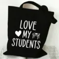 Simple black canvas tote bag with teacher theme letter print, large capacity daily shopping bag. - Style 11