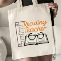 Beige Stofftasche für Lehrer, große Kapazität, minimalistische Handtasche mit Buch-Grafik. - Leselehrer Bücher Brille Stil (15) / 35x40cm
