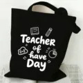 Black canvas tote bag with teacher graphic, large capacity casual shoulder bag for daily use. - Style 9