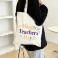 Detailed view of large capacity canvas tote bag with teacher day print and floral pattern. - Style 8