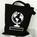 Black canvas tote bag with globe print, large capacity minimalist shoulder bag for students. - Style 5