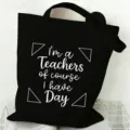 Black canvas tote bag with teacher text, large capacity casual shopping handbag for daily use. - Style 3
