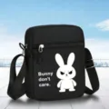 Sac bandoulière mini noir avec imprimé lapin mignon, fermeture éclair et sangle réglable. - Style lapin
