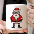 Detailed close-up view of the white ceramic coffee mug with a cool Santa Claus print. - 350ml / White