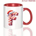 Close-up detail of the custom Christmas letter F mug with candy cane pattern and red handle. - 350ml / Letter F