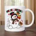 Detailed view of white ceramic coffee mug with festive snowman design and Feliz Navidad text. - White (Snowman)