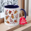 Detailed view of white ceramic coffee mug with blue handle, featuring cute Christmas gingerbread patterns. - 350ml / Blue