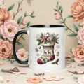 Christmas ceramic coffee mug detail with festive stocking pattern and elegant floral background. - White