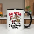 Festive ceramic coffee mug detail showcasing a cute holiday print with Santa and reindeer. - 350ml / Black and White Patchwork