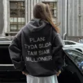 Streetwear oversized charcoal hoodie detail showing back graphic print and drop shoulder fit. - XS / Tops / Dark Gray