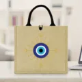 Evil eye burlap tote bag with sturdy black handles, ideal for daily shopping, travel and picnics. - Evil Eye Geometric Print Style