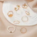 Juego de anillos dorados con estrella de mar concha y perla para moda diaria elegante. - Serie Estrella de Mar Concha Océano (8 Piezas)
