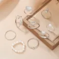 Lindo juego de anillos abiertos plateados con perla estrella de mar y corazón para regalo joya - Serie Estrella de Mar Concha Océano (9 Piezas)