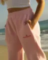 Pink women sweatpants, casual high-waisted pink jogger pants with side pockets and logo. - XS / Bottoms / Pink