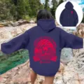 Sweat à capuche ample pour femme avec épaules tombantes et impression de vagues. - Bleu Marine