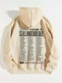 Close-up detail of fleece-lined hoodie featuring front graphic text print and drawstring. - S / Apricot