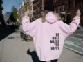Oversized pink hooded sweatshirt for women, casual long sleeve hoodie with back letter print. - S / Tops / Pink with Black Text