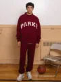 Burgundy sweatshirt and sweatpants tracksuit with PARKE letter print for men, casual and stylish. - Wine Red - White Font / XS