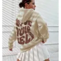 Sweat à capuche polaire femme avec imprimé au dos, pull beige tendance pour look streetwear. - Kaki