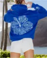 Blue fleece hoodie featuring a large white floral and sea shell graphic on the back. - XS / Tops / Blue Hibiscus
