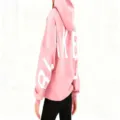 Pink oversized hooded sweatshirt featuring bold back letter prints, cozy and stylish daily wear. - Pink White Label