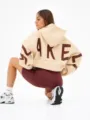 Oversized hooded sweatshirt for women with bold back letter print, cozy thick fabric. - Apricot Card