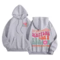 Grey fleece-lined hooded sweatshirt for women, featuring vintage chest and back graphic prints. - XS / Light Gray