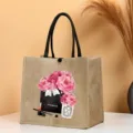 Detailed view of the stylish floral burlap tote bag featuring elegant pink peony prints. - Pattern 3