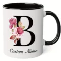 Personalized letter B ceramic coffee mug with watercolor floral design and black handle rim. - 350ml / Letter B