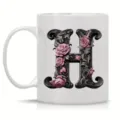 Ceramic coffee mug with floral gothic letter H design, perfect for office and daily use. - Letter H