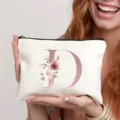 Leinen Kosmetiktasche mit floralem Buchstaben D Druck, tragbare Make-up Tasche für Damen. - Buchstabe D