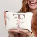Leinene Kosmetiktasche mit floralem Buchstaben T Druck für Reise und tägliche Aufbewahrung. - Buchstabe T
