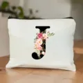 Weiße Kosmetiktasche aus Canvas mit floralem Buchstaben J, Reißverschluss, tragbarer Organizer. - Buchstabe J