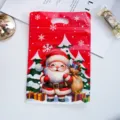 Nuova borsa di plastica rossa di Natale con manico per regalo caramelle confezione 25pz - Babbo Natale / Confezione da 25