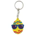 Schöner Oster-Ei Schlüsselanhänger mit cooler Sonnenbrille und Cartoon Motiv als Geschenk. - Osterei